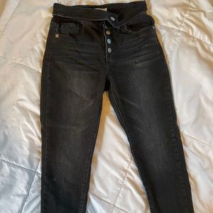 Black button fly skinny leg denim